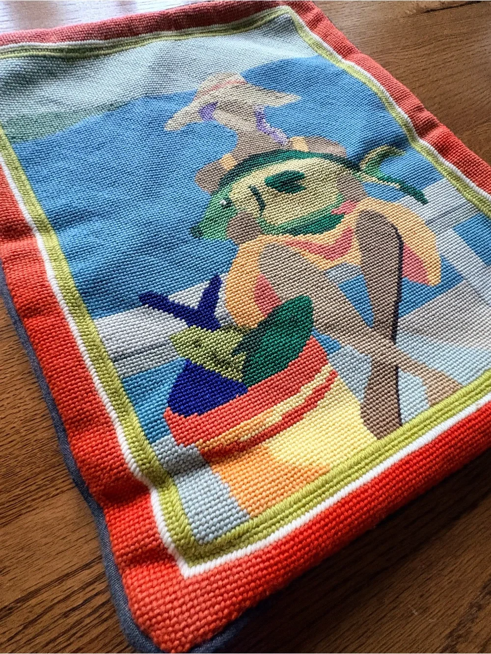 Custom Needlepoint pillow covers with cording, zippers & striped fabric backing